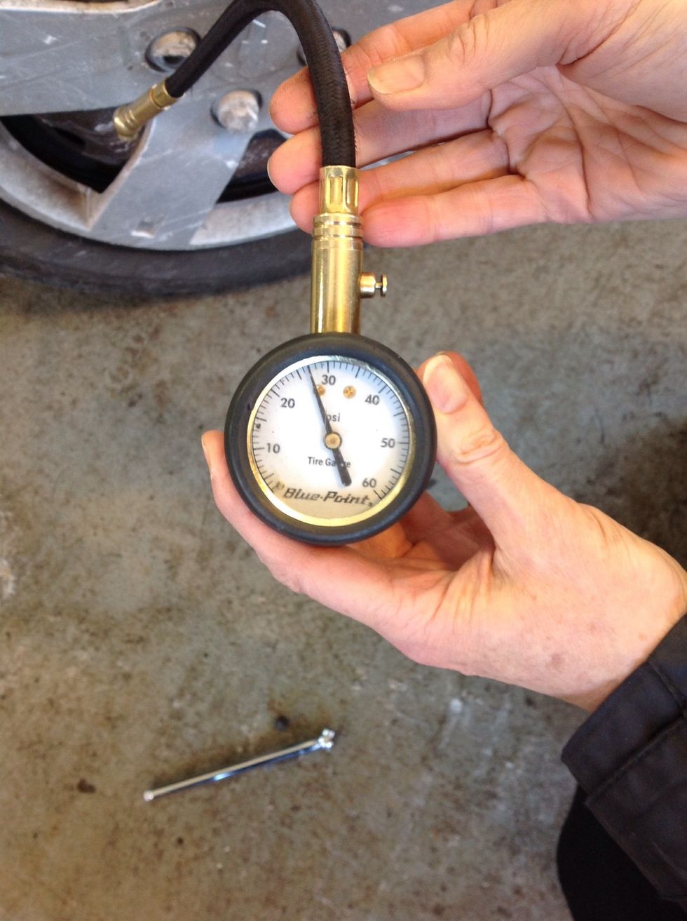 Read the dial on the gauge. This is at 26 PSI - 4 PSI below it's recommended amount.