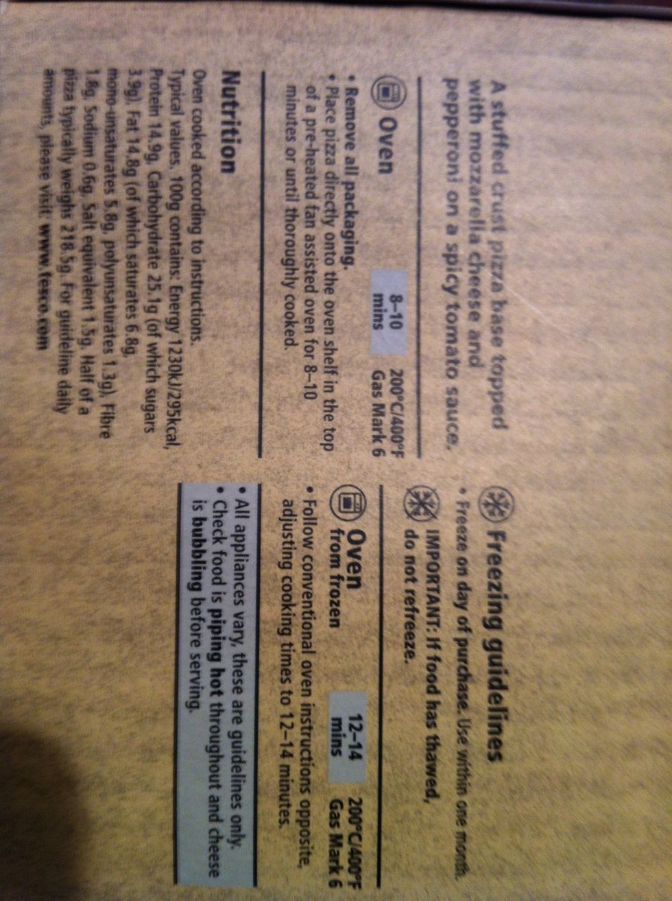 read the instructions on the pizza box and start to pre heat your oven