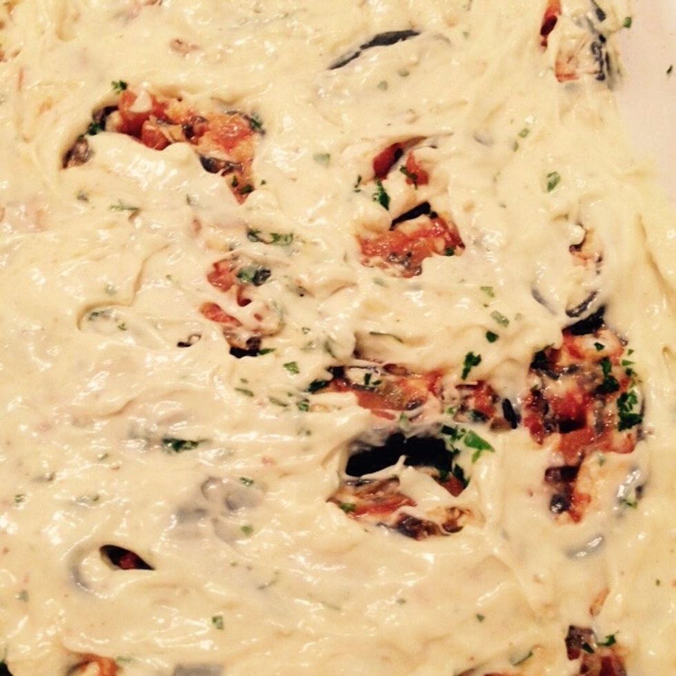 Ready to be baked. Cook for 30min in a preheated 180C oven, until the b\u00e9chamel on top starts browning