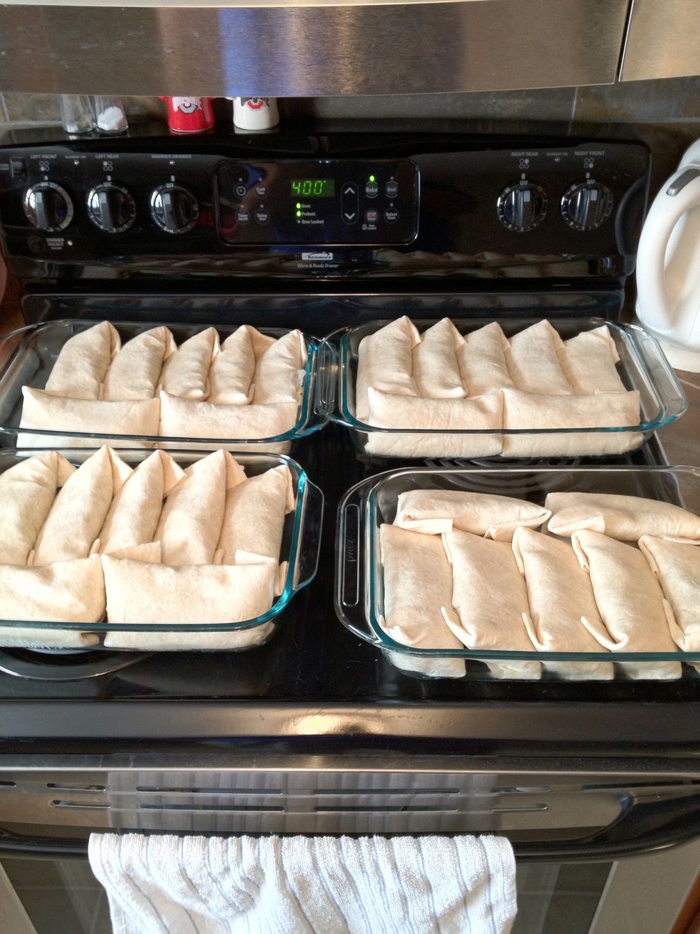 Ready to go. (with two off camera in a small dish.) I do 2 pans at a time, side by side, for about 20 minutes, until the edges of the tortillas start to brown. If you stack, the bottom rack will burn.