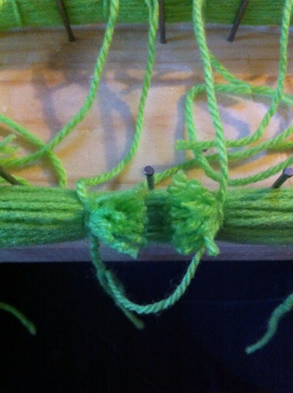 Really pull two middle section knots and cut through in line with nail. Just slip scissors under a few strands at a time.