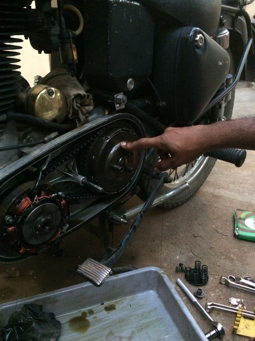 Reassemble as per the photo, the inner most and outer most plates should have the bend edge towards you or facing outward of the engine core.