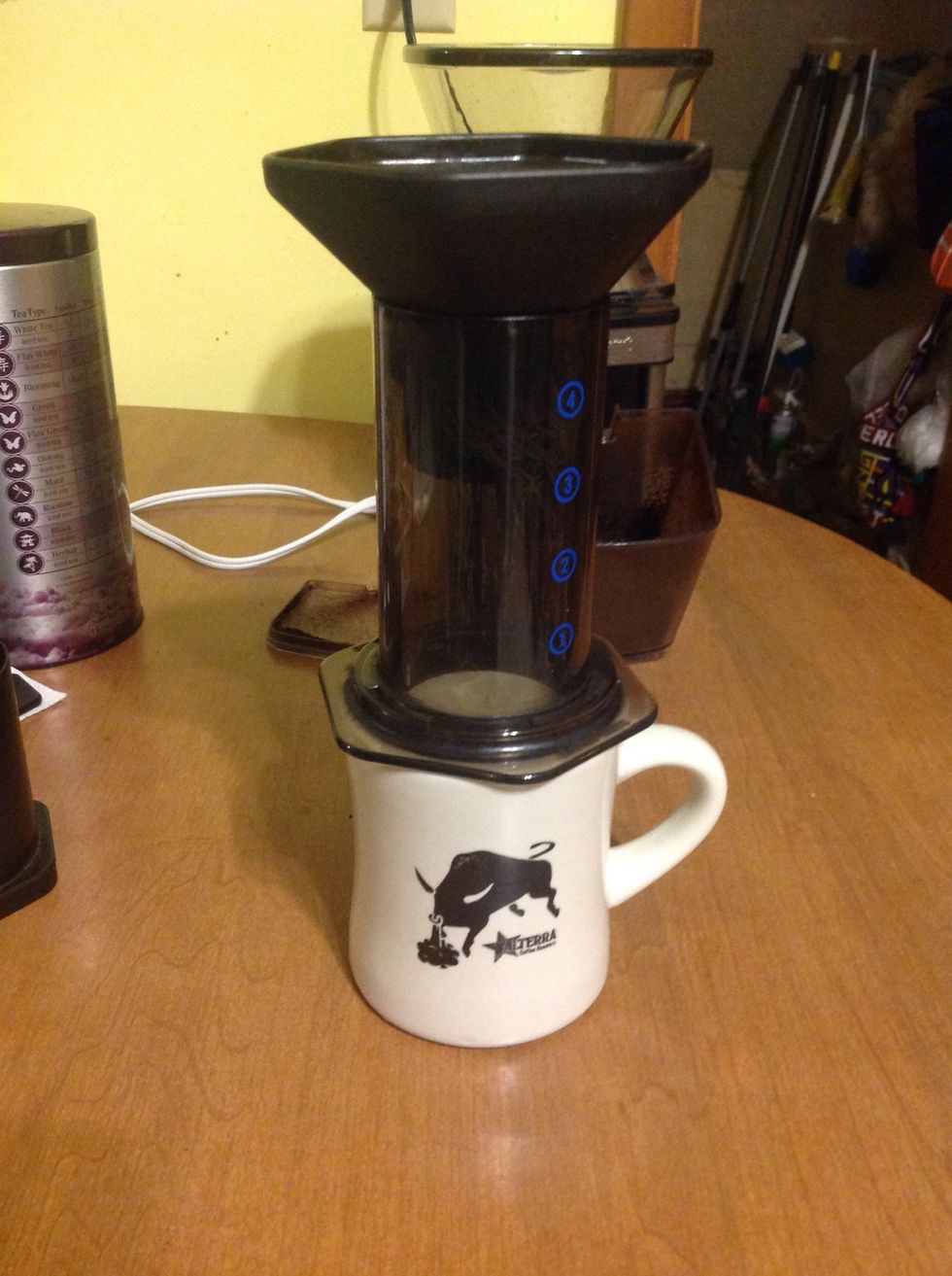 Reattach Aero Press cylinder and place it on your empty mug.