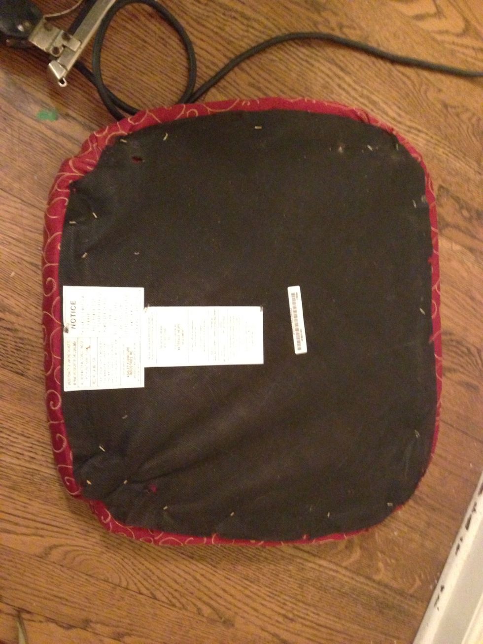 Reattach the fabric cover.