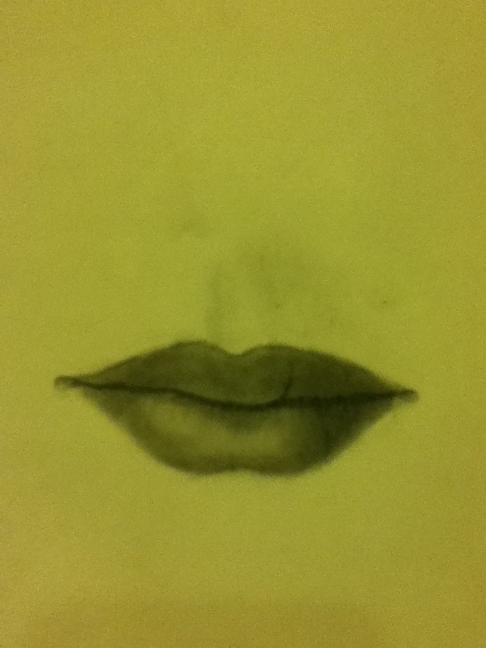 Redraw the line in-between the lips and start to define the wrinkles...