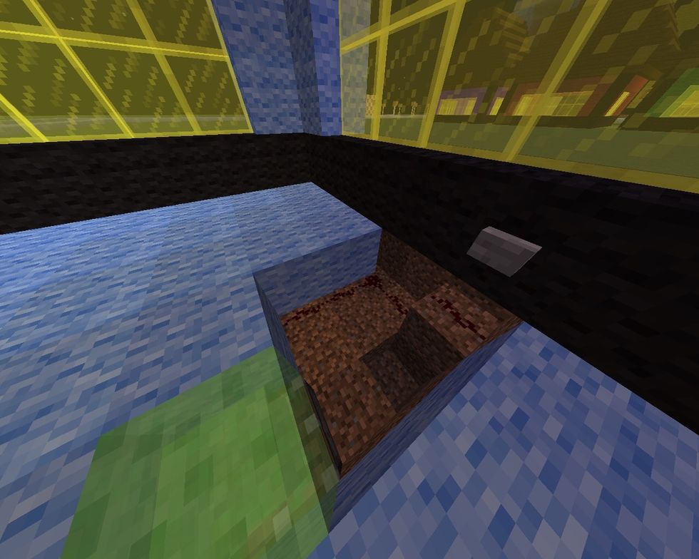 Redstone from the button to the sticky piston