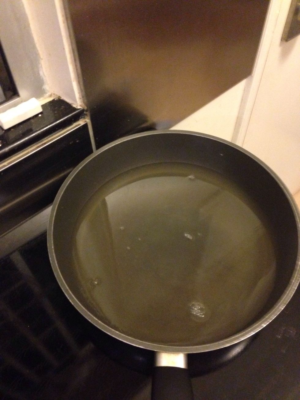 Reduce chicken broth to half original volume