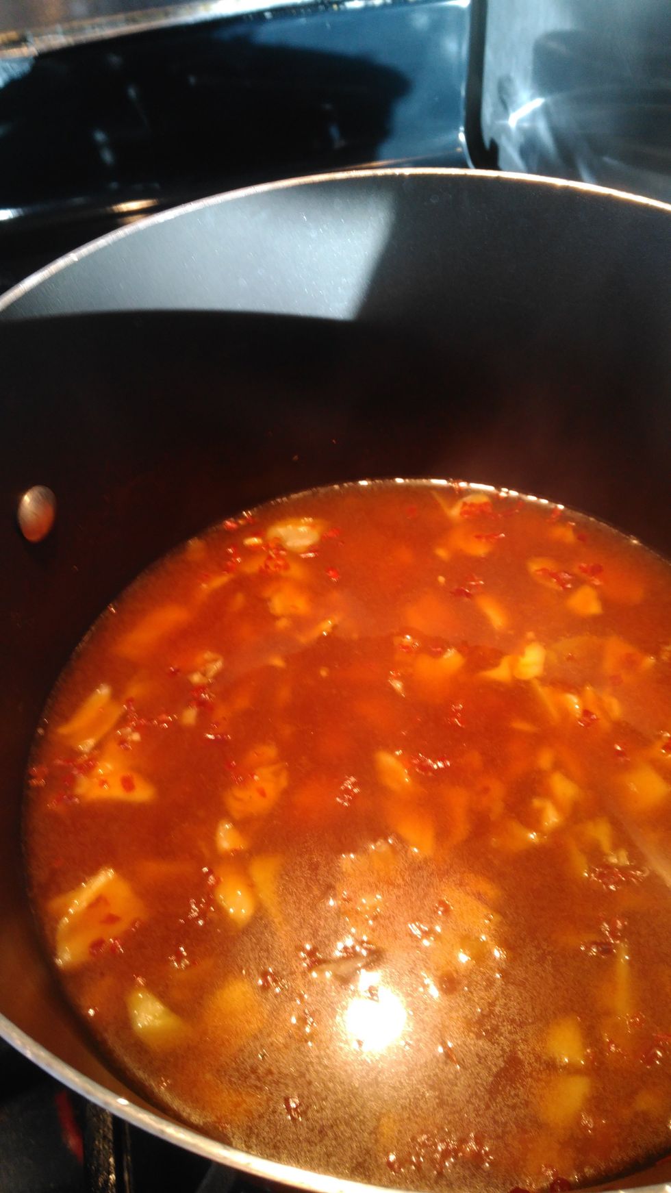 Reduce heat and add Kochujang.