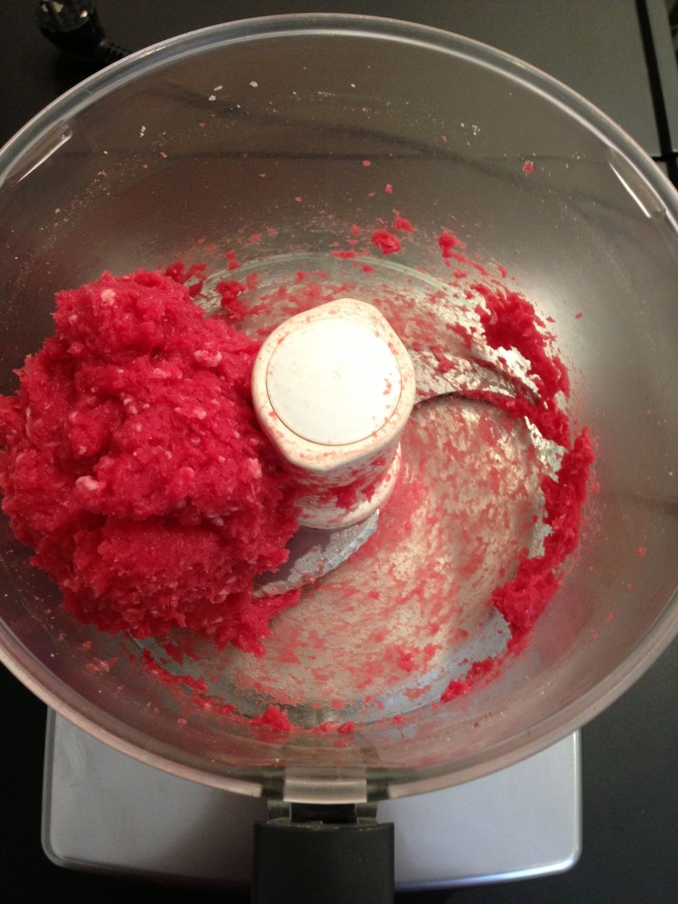 Reduce meat to a paste