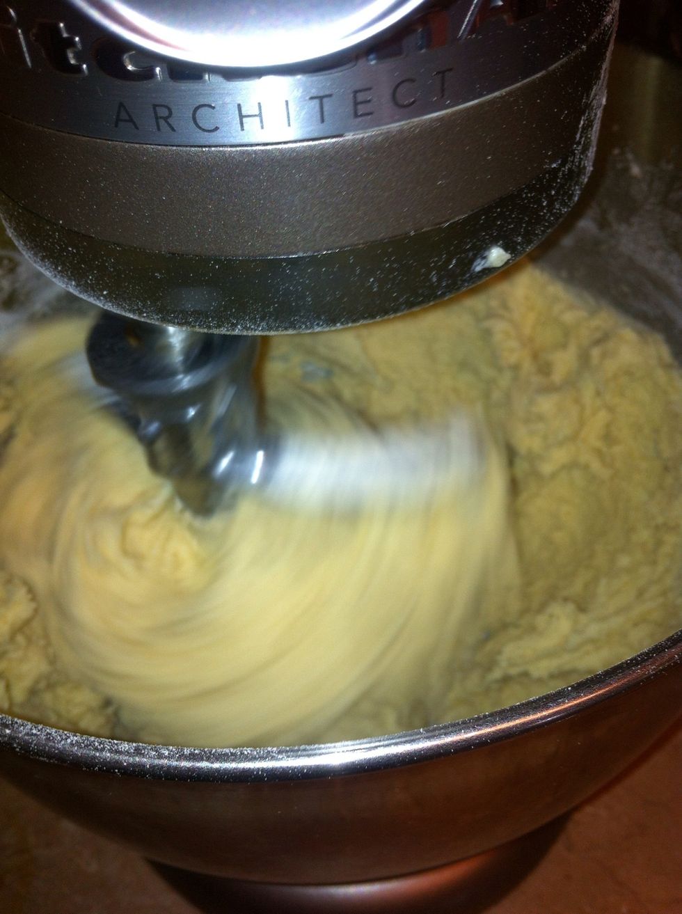 Reduce mixer speed to low and slowly add in flour mixture, until combined, about 30 seconds.