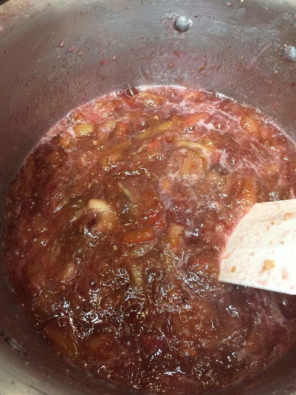 Reduce mixture to a medium simmer, stirring occasionally, until thickened (20-25min). Break down any large rhubarb pieces with the spoon.