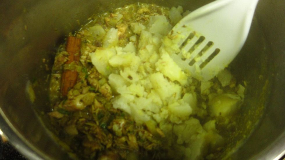 Reduce temperature to medium low (setting 3) and add the boiled potato and mash it into the fish. Cook until the the paste mix is firm enough to make into balls. About 10-15 minutes.