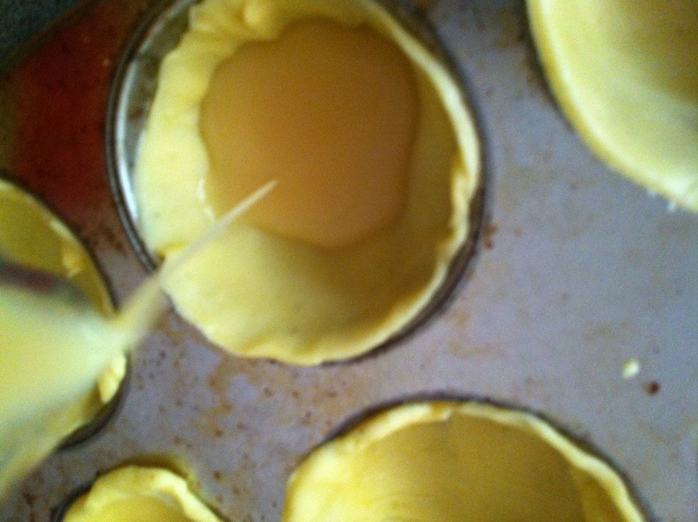 Reduce the temperature to 350 degrees F/180 degrees C and bake another 10-12 minutes, until filling is just set (if a toothpick can stand up in it, it\u2019s done).