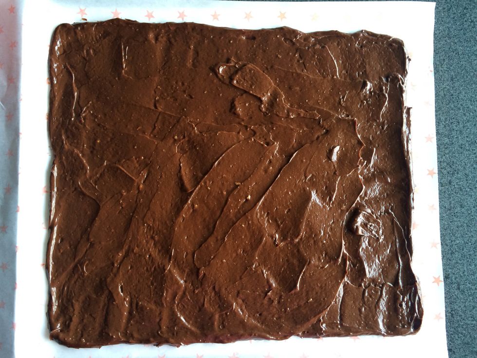 Refrigerate for 3 hours. Cut 2.5 cm (1") squares with a blunt knife or spatula. Refrigerate overnight.