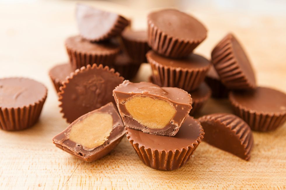 Refrigerate the cups for 20 minutes until the chocolate is set and then remove the muffin tins and serve.