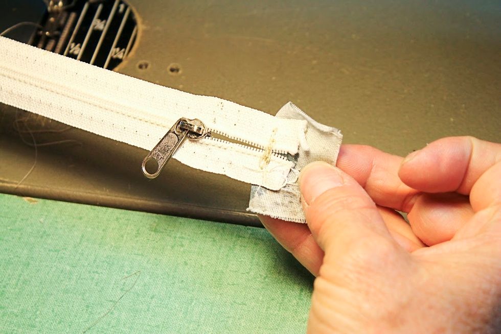 Reinforce by stitching back and forth.  Don't want that slide coming off!  It is a booger to get back on.  Set aside.