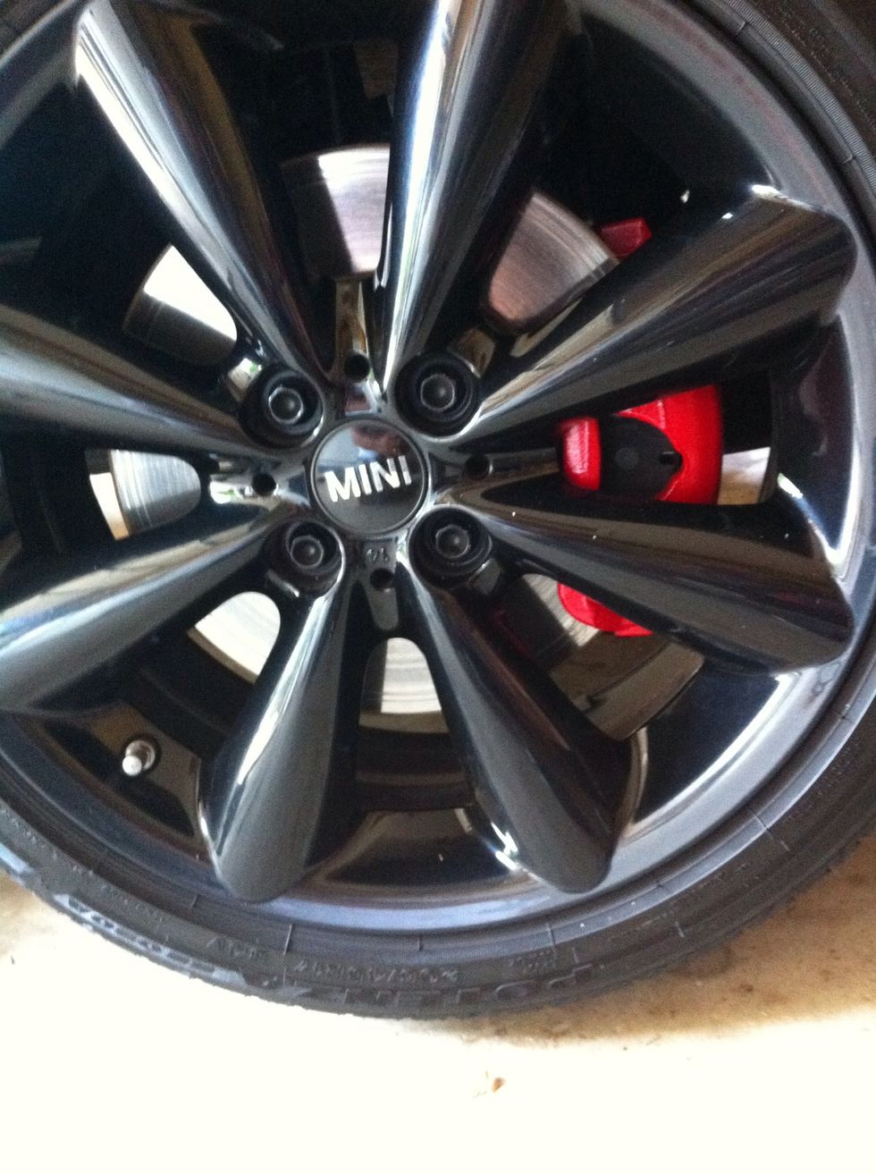 Reinstall wheel and lower car.