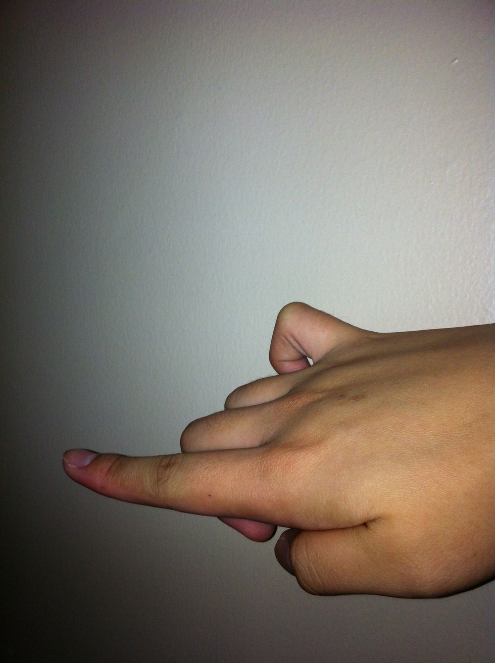 Release the middle finger and push first finger upward It make it harder