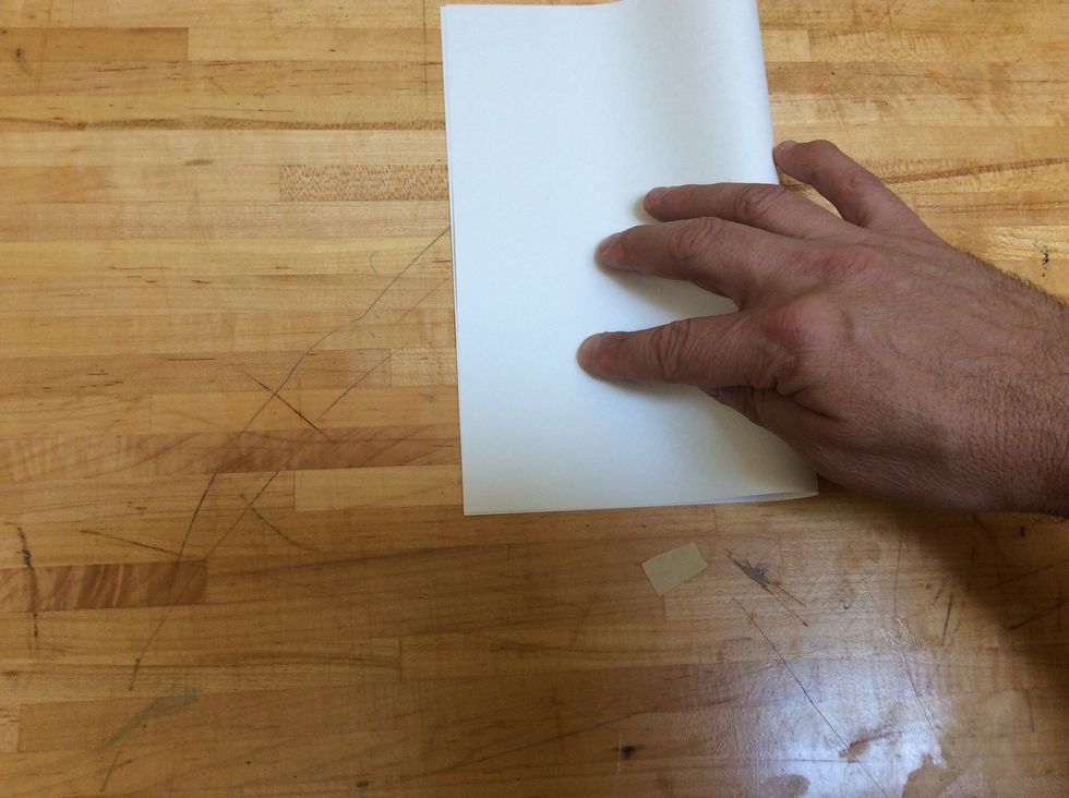 Remember that folded piece of paper you set aside? Well, now we're going to use it.