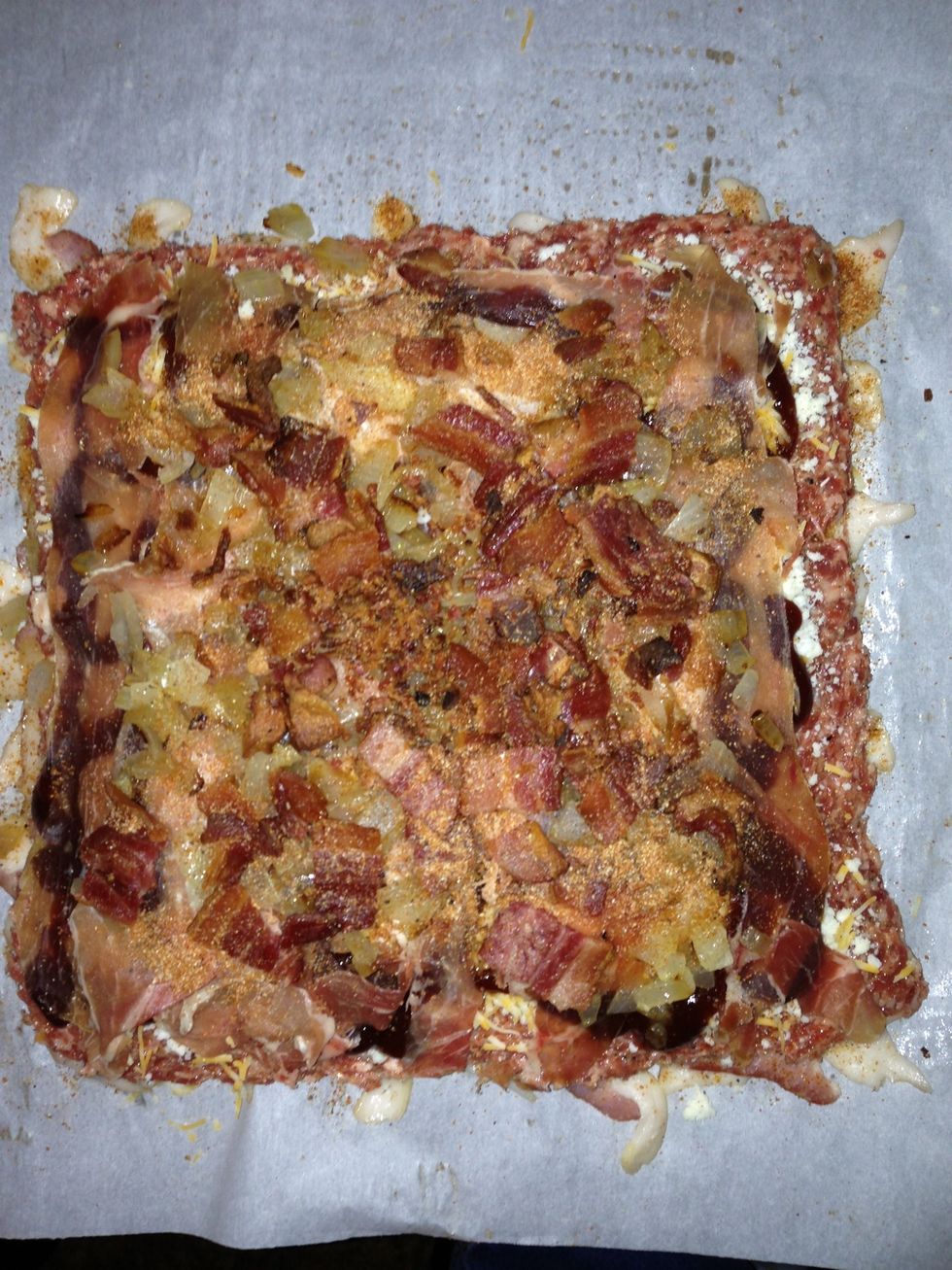 Remember your saut\u00e9ed onion and bacon pieces?  Add them now.  Spread them out all over.