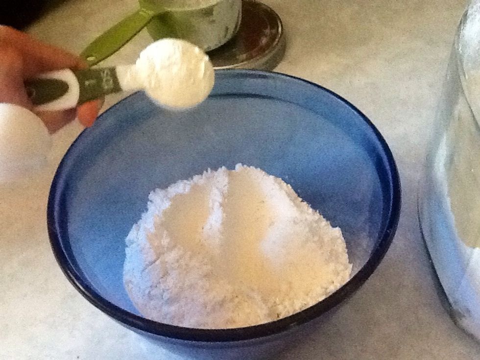 Remove 2 tablespoons of the flour, again or more if you are doing a larger amount of flour. So that's two tablespoons for each 1 cup of flour. Put it back into your flour container, we don't need it