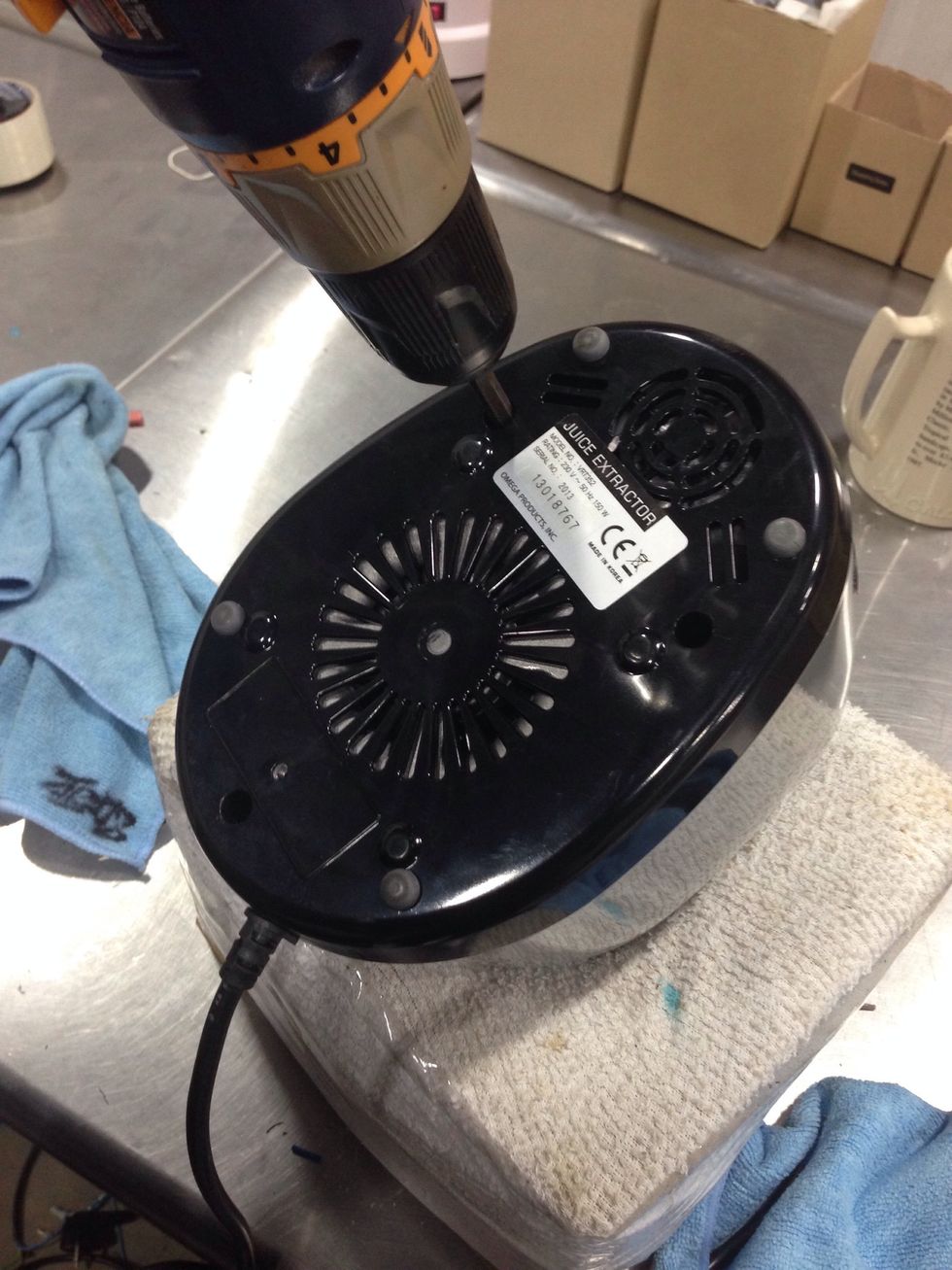 Remove 3 Philips Head Screws From The Base