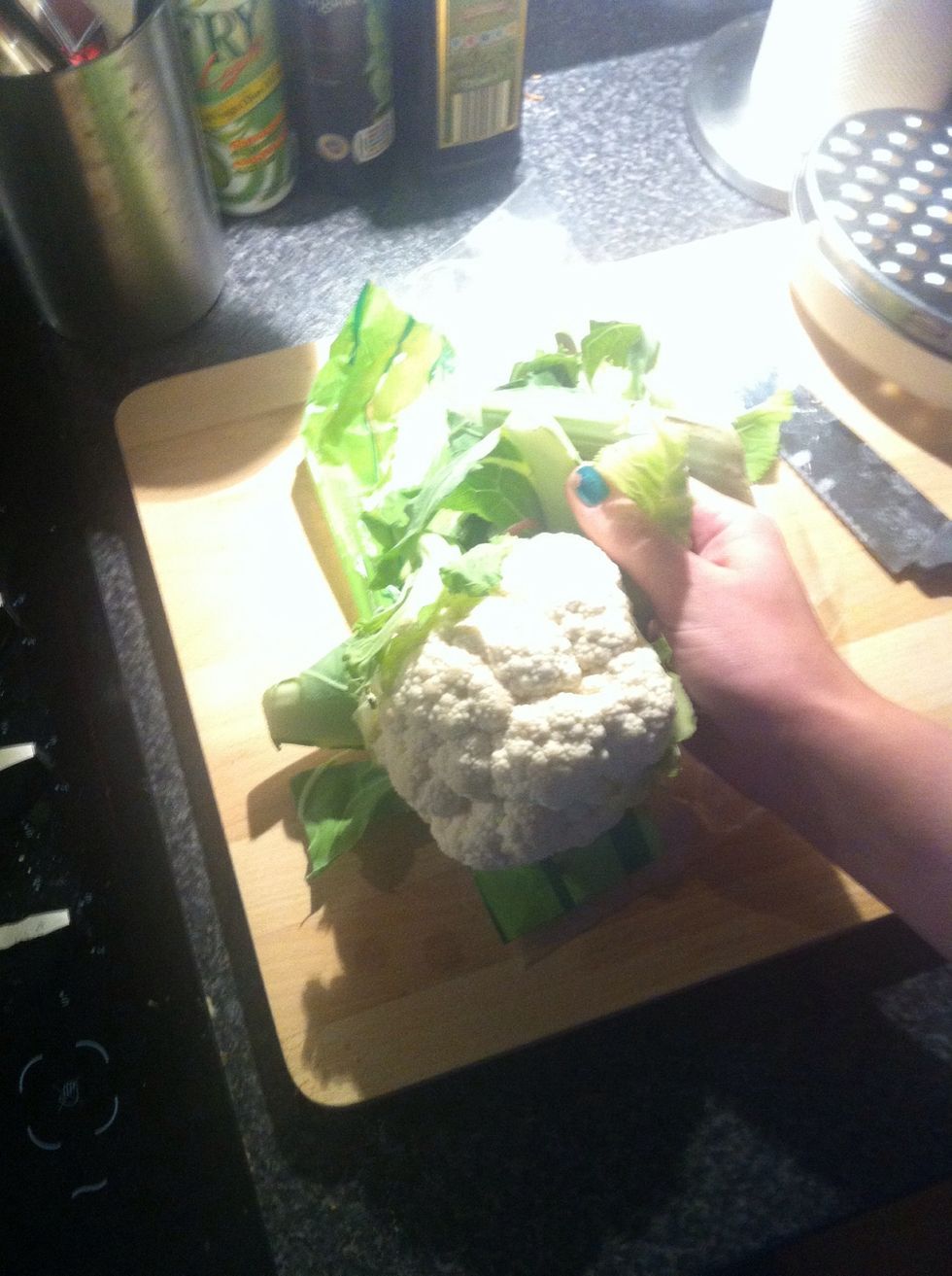 Remove all leaves from around the cauliflower.