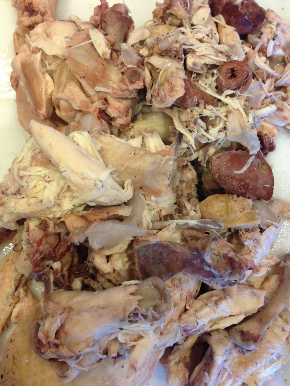 Remove all of the chicken parts from the pot.
