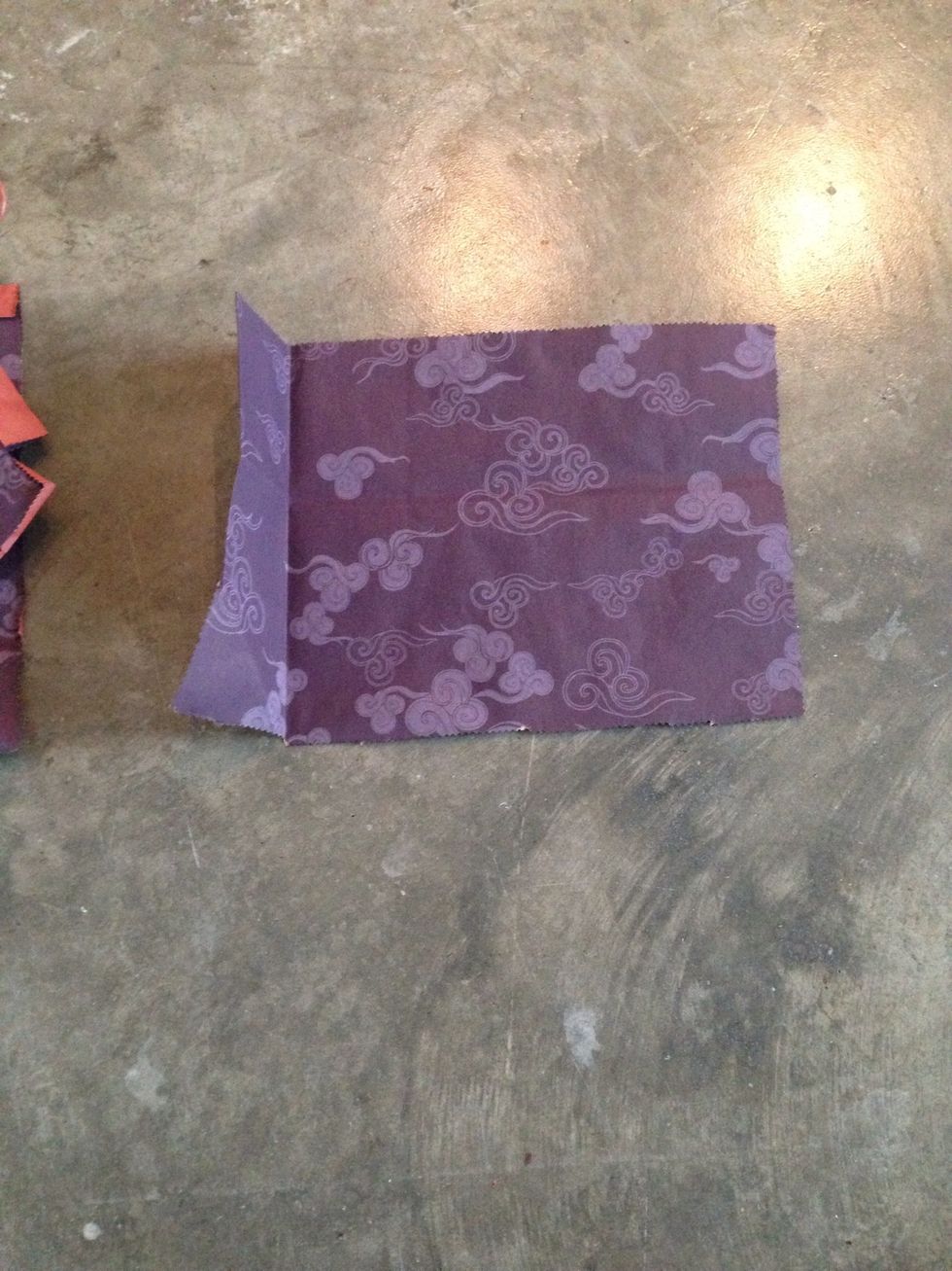 Remove all parts of the bag leaving one large side (logo side) and one small side (width of the bag)