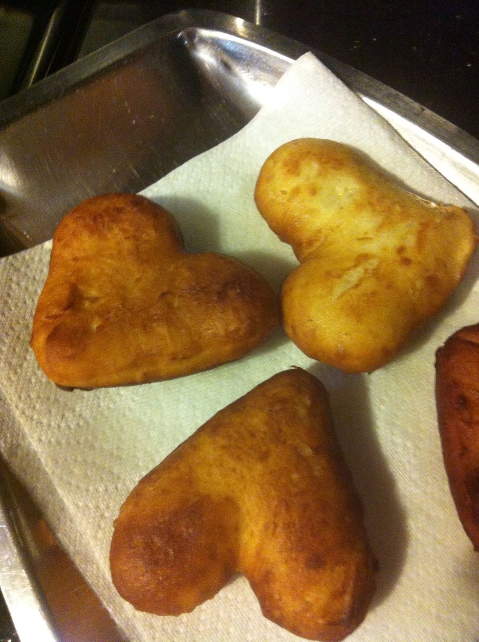 Remove and place on a paper towel to drain excess oil.