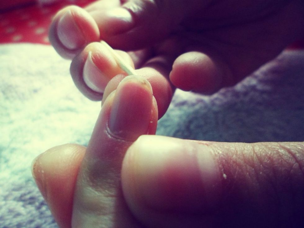 Remove any dirt underneath the nail with a toothpick. \u2728