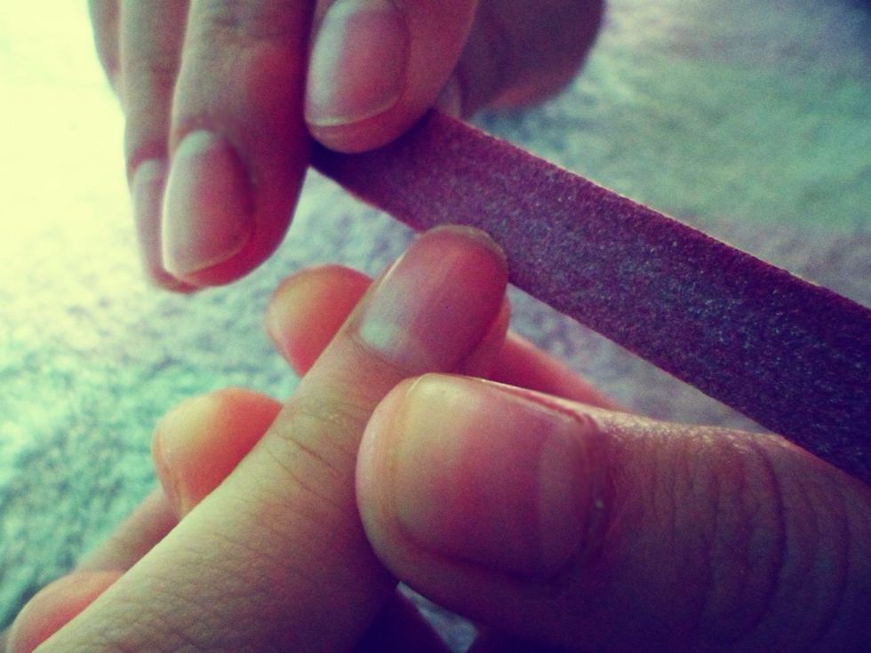 Remove any nail polish off, and begin by filing your nails. Try not to file back and forth, as this will damage your nails. Instead, get into the habit of filing in a sweeping motion. \ud83d\udc4d