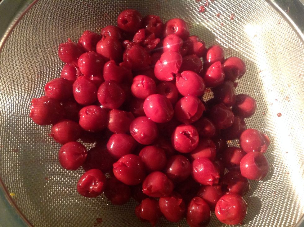 Remove any stalks and pips from the cherries.