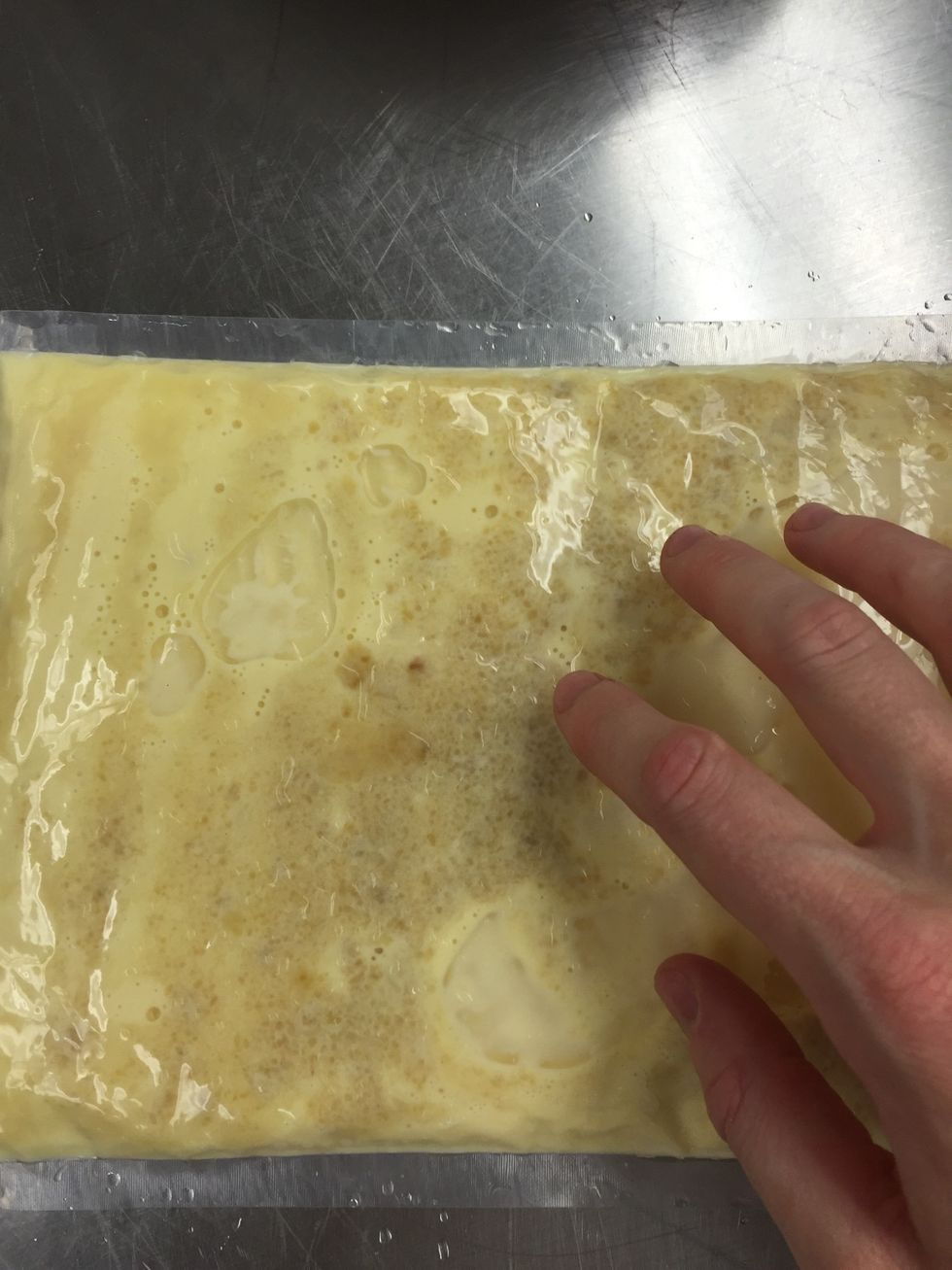 Remove bag and massage gently to break up any clumps.