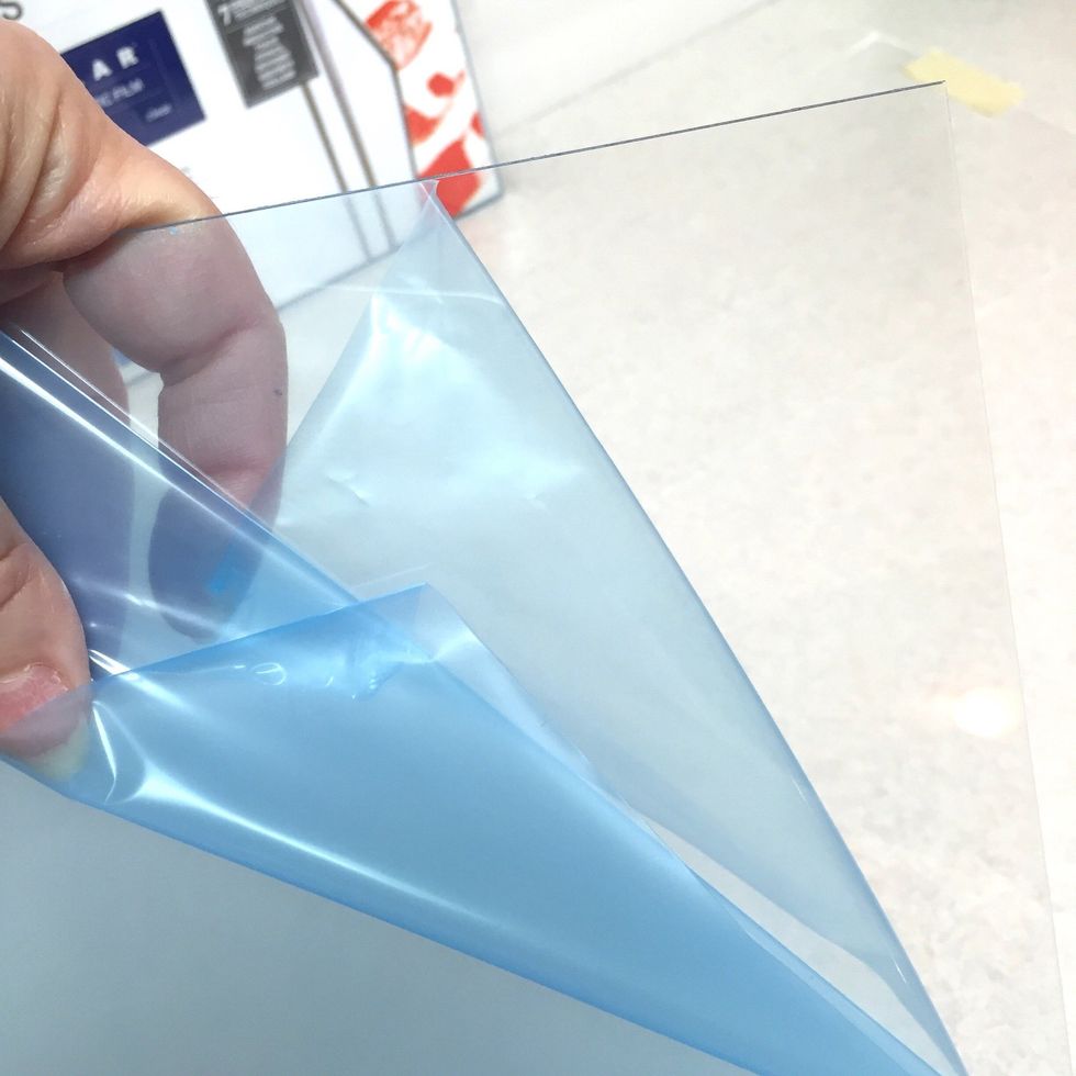 remove blue protective film from both sides of the plate. prep your work surface by using a craft mat, waxed paper or other covering. using something non-absorbent will allow excess ink to be used.