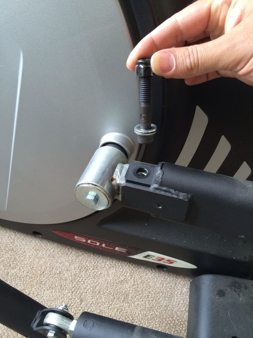 Remove bolt and nut using a wrench and pressure pliers. Remove from each arm.