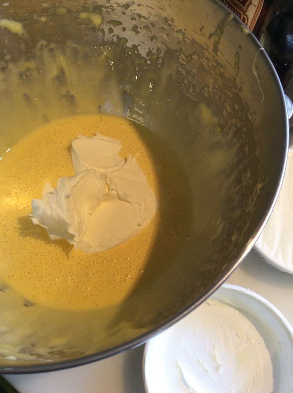 Remove bowl from mixer and add 1/ 2 of the mascarpone.