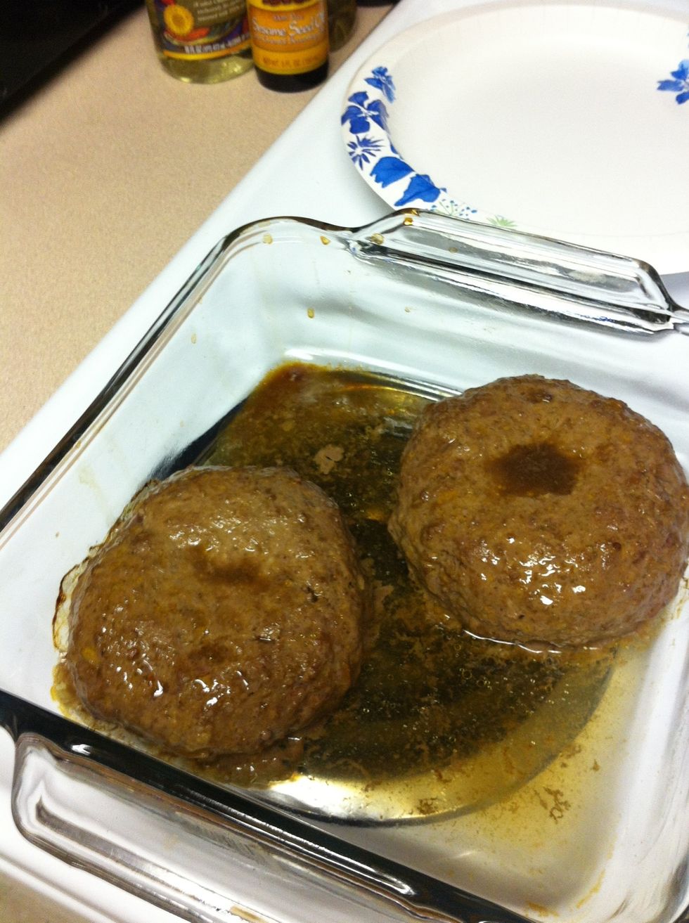 Remove burgers about 10 minutes later and baste the burgers with beer again. Put back in oven.