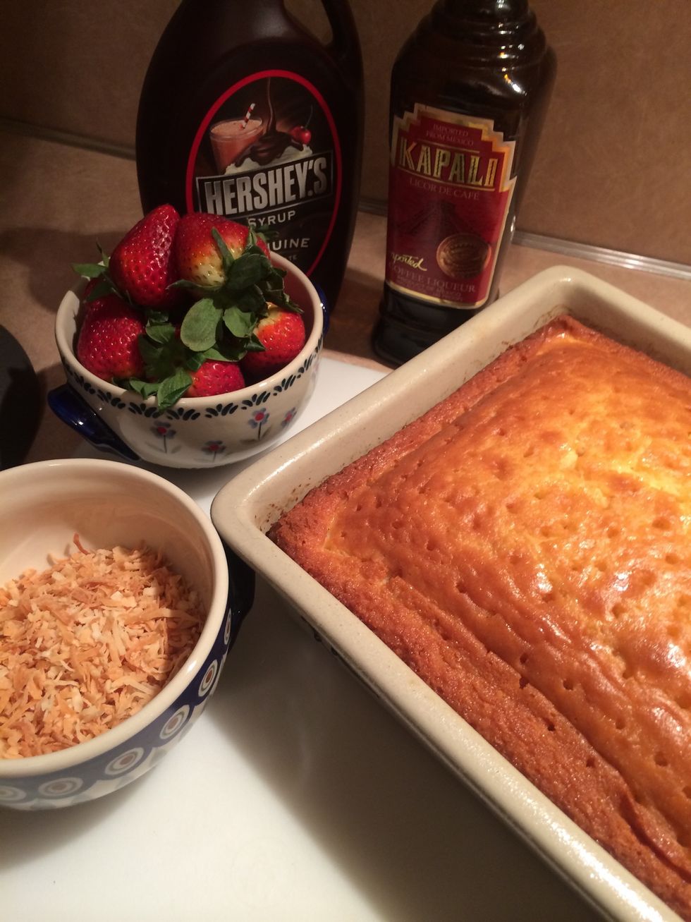 Remove cake from refrigerator.