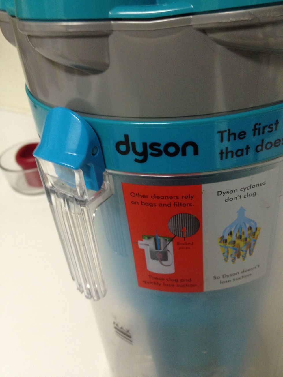 Remove catch can by pressing button.