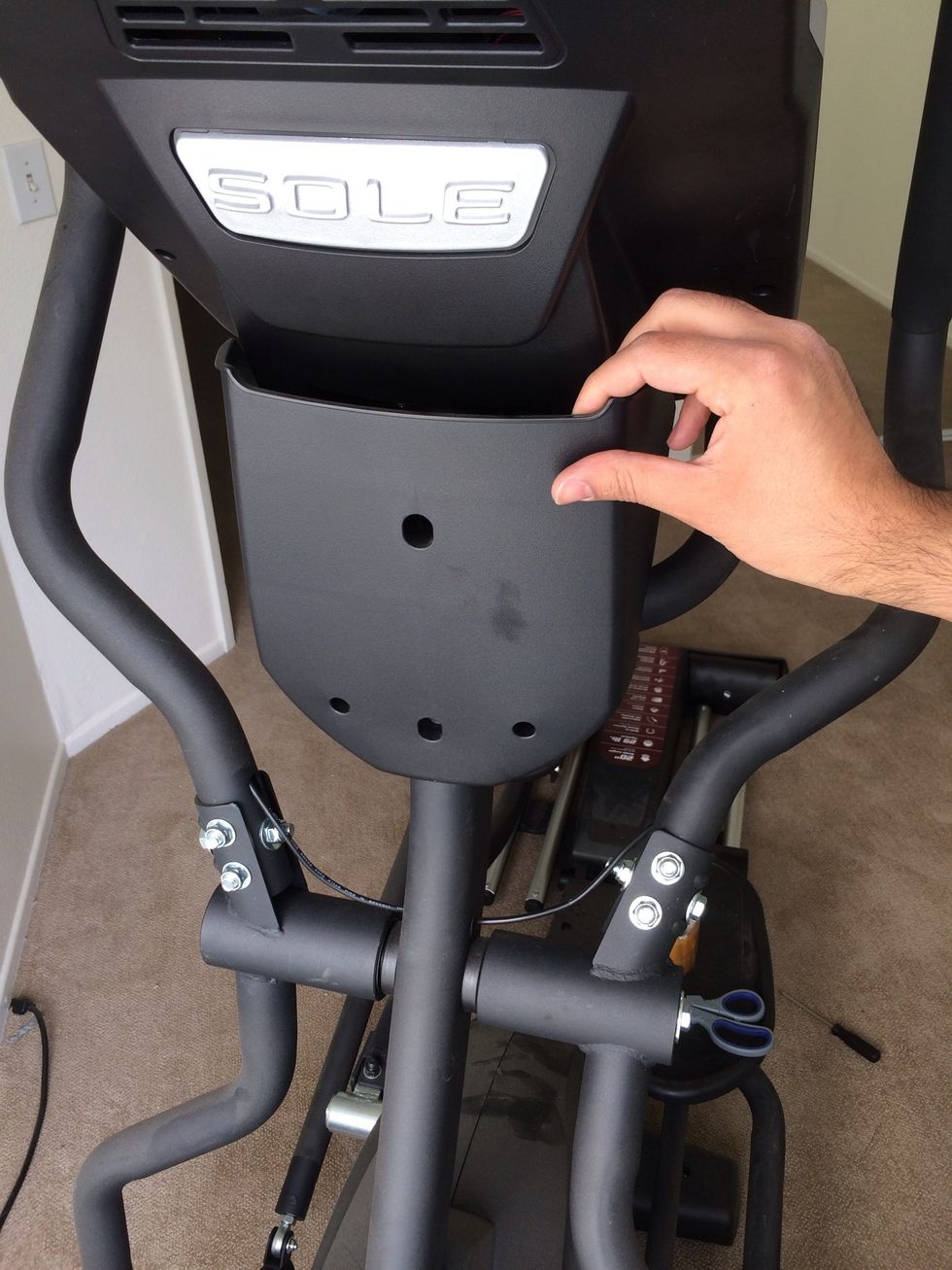 Remove center cover. 2 small screws; 2 bolts on outside; 1 bolt on inside.