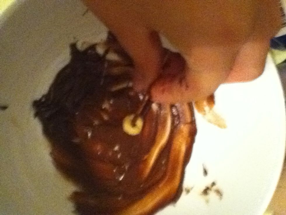 Remove Cheerios from chocolate, and clear hole of chocolate also with the toothpick.