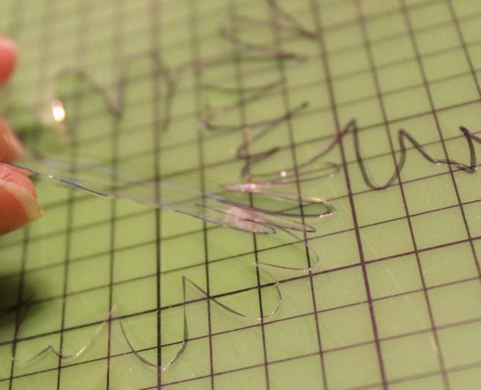 remove cut out portions. repeat to cut out flower centers and leaves...