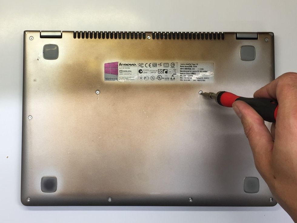 Remove each of these two screws with the T5 Torx Screwdriver. Set them safely aside.