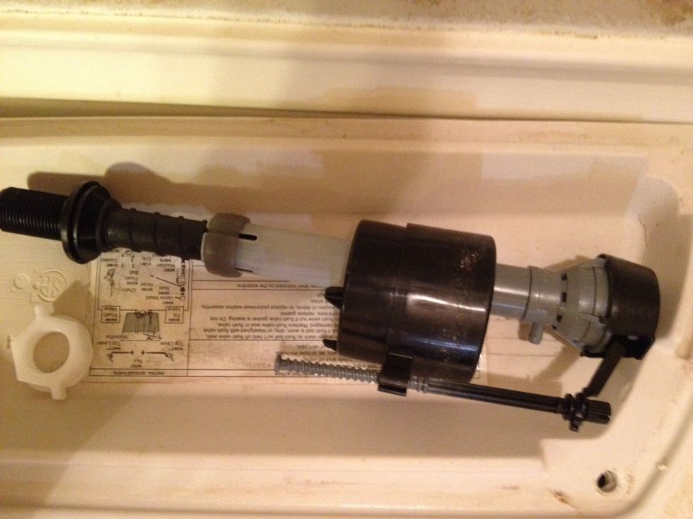 Remove flow valve (attached under tank).