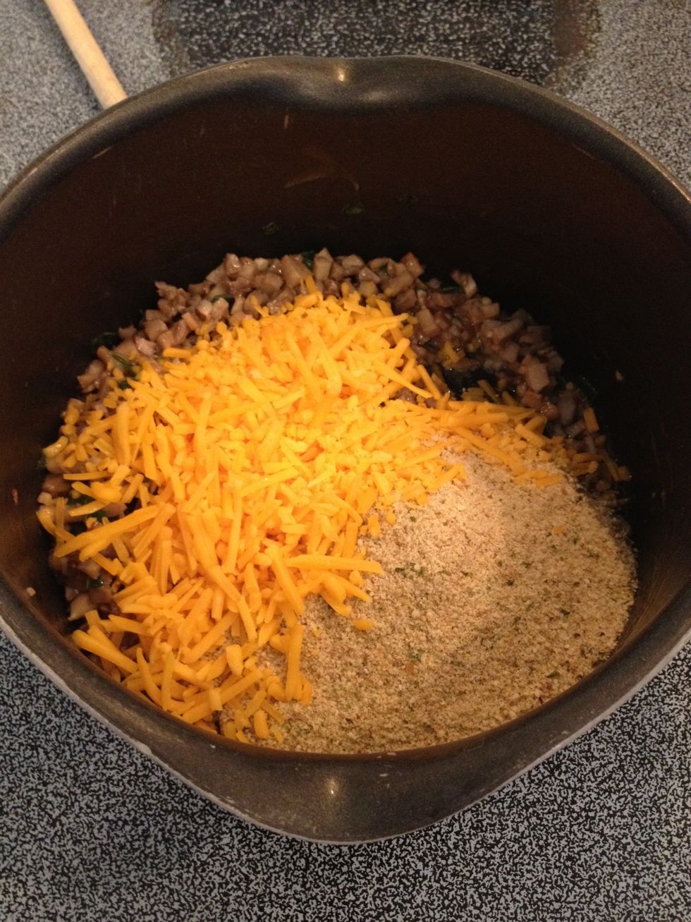 Remove from heat.  Add cheese and bread crumbs.
