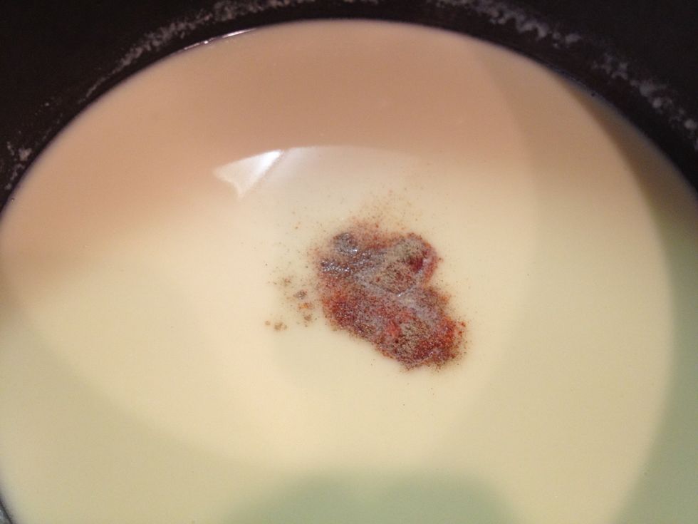 Remove from heat. Add white pepper, salt and cayenne pepper and stir.