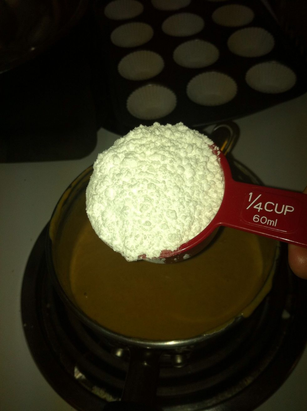Remove from heat and add the powered sugar 1/4 cup at a time.
