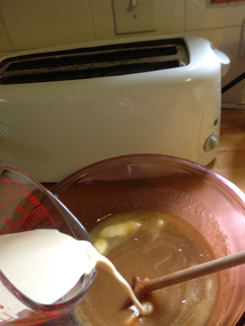 Remove from heat and transfer to large bowl. Add remaining butter and milk. Stir until incorporated.