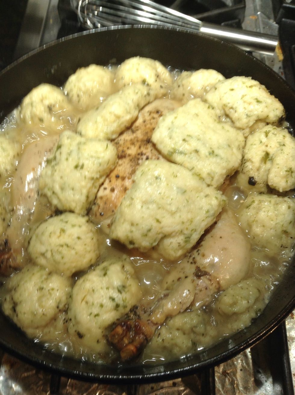 Remove from oven add remaining stock and surround with dumplings cover and cook on stovetop medium heat for 15 to 20 minutes serve immediately.